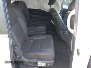 2014 Honda Odyssey EX-L with VIN 5FNRL5H63EB064854, listed as a IAAI auction lot 42102704 with 148,536 mi miles and . Bid and sale history available at carsss.com. Image 8.