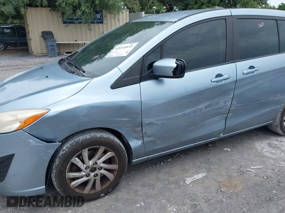 2012 Mazda 5 Sport with VIN JM1CW2BL4C0130446, listed as a IAAI auction lot 42215533 with 238,221 mi miles and . Bid and sale history available at DreamBid. Image 6.