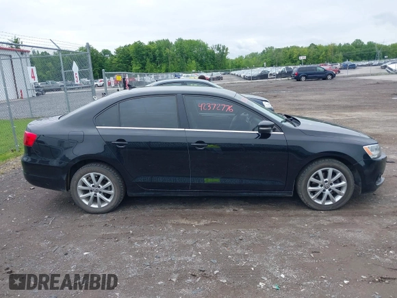 2013 Volkswagen Jetta SE z VIN 3VWDX7AJ5DM258429, wystawiony jako IAAI lot #42372776 z przebiegiem 211 579 mil mil oraz . Historia ofert i sprzedaży dostępna na DreamBid. Obrazek 13.