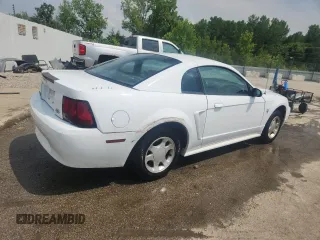 2000 Ford Mustang with VIN 1FAFP404XYF130074, listed as a Copart auction lot 60874945 with 233,035 mi miles and Non repairable. Bid and sale history available at DreamBid. Image 3.