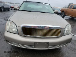 2004 Cadillac DeVille DTS z VIN 1G6KF57944U117834, wystawiony jako Copart lot #89320975 z przebiegiem 149 820 mil mil oraz Szkody całkowita. Historia ofert i sprzedaży dostępna na DreamBid. Obrazek 5.