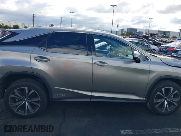 2022 Lexus RX 450h с VIN 2T2HGMDA0NC074486, выставлен на аукционе IAAI как лот 41434677 с пробегом 50 955 миль миль и . История ставок и продаж доступна на DreamBid. Изображение 13.