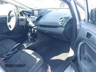 2019 Ford Fiesta SE with VIN 3FADP4EJ0KM107058, listed as a IAAI auction lot 40979683 with 116,854 mi miles. Bid and sale history available at carsss.com. Image 5.