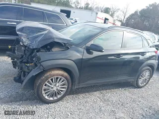 2021 Hyundai Kona SEL with VIN KM8K22AA1MU605029, listed as a IAAI auction lot 41478328 with 57,429 mi miles. Bid and sale history available at carsss.com. Image 14.