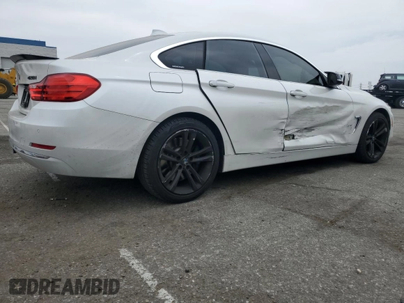 2015 BMW 4 Series 428i xDrive with VIN WBA4C9C59FD331372, listed as a Copart auction lot 58628665 with 81,245 mi miles and Salvage title. Bid and sale history available at DreamBid. Image 3.