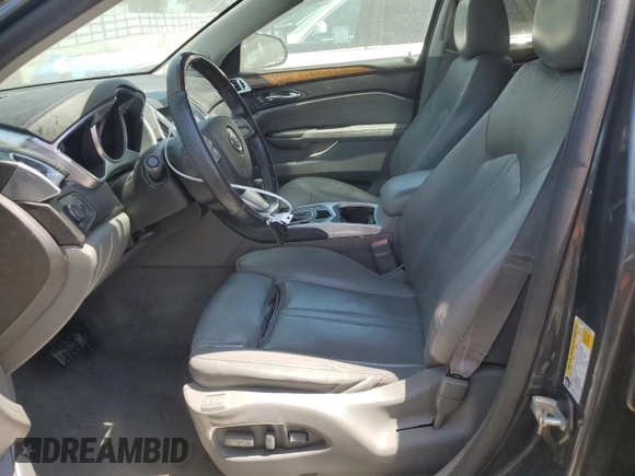 2012 Cadillac SRX Performance Collection z VIN 3GYFNBE32CS596228, wystawiony jako Copart lot #60002985 z przebiegiem 71 738 mil mil oraz Szkoda całkowita • Salvage title. Historia ofert i sprzedaży dostępna na DreamBid. Obrazek 7.