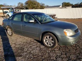 2005 Ford Five Hundred SEL with VIN 1FAHP27195G124300, listed as a Copart auction lot 80948394 with 141,765 mi miles and Salvage Title. Bid and sale history available at carsss.com. Image 4.
