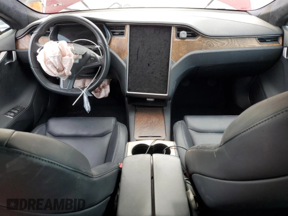 2020 Tesla Model S Long Range with VIN 5YJSA1E22LF401139, listed as a Copart auction lot 44770285 with 128,685 mi miles and Salvage title. Bid and sale history available at DreamBid. Image 8.