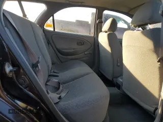 1999 Hyundai Elantra z VIN KMHJW25F1XU128645, wystawiony jako Copart lot #82970984 z przebiegiem 118 048 mil mil oraz Szkoda całkowita • Salvage title. Historia ofert i sprzedaży dostępna na DreamBid. Obrazek 10.