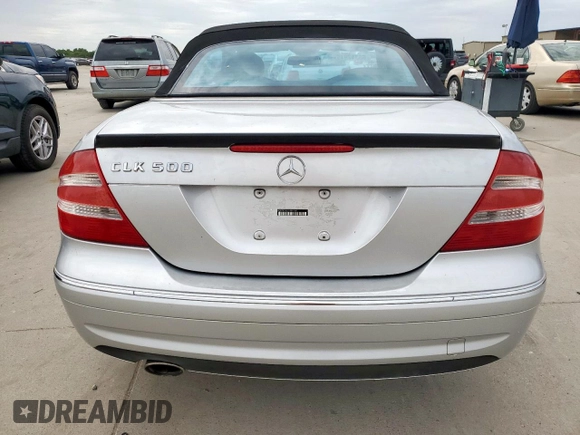 2005 Mercedes-Benz CLK 500 z VIN WDBTK75G75T041381, wystawiony jako Copart lot #63317915 z przebiegiem 85 750 mil mil oraz Szkoda całkowita • Salvage title. Historia ofert i sprzedaży dostępna na DreamBid. Obrazek 6.