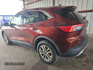 2021 Ford Escape SE with VIN 1FMCU9G64MUB24900, listed as a IAAI auction lot 42730688 with 89,597 mi miles and . Bid and sale history available at DreamBid. Image 5.