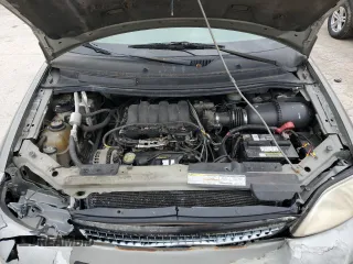 1999 Ford Windstar SE with VIN 2FMZA5241XBC17594, listed as a Copart auction lot 51452644 with Not Provided miles and Salvage Title. Bid and sale history available at carsss.com. Image 11.