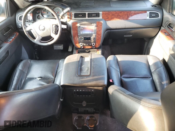 2014 Chevrolet Tahoe LTZ с VIN 1GNSKCE07ER137878, выставлен на аукционе Copart как лот 59905605 с пробегом 213 584 миль миль и Списание • Salvage title. История ставок и продаж доступна на DreamBid. Изображение 8.