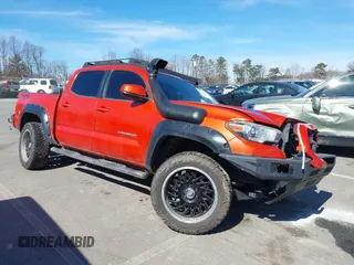 2017 Toyota Tacoma SR5 with VIN 5TFAZ5CN3HX023869, listed as a IAAI auction lot 41661581 with 158,145 mi miles. Bid and sale history available at carsss.com. Image 1.