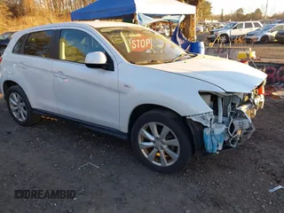 2015 Mitsubishi Outlander SE z VIN 4A4AR4AU5FE060511, wystawiony jako IAAI lot #41274441 z przebiegiem 82 915 mil mil oraz . Historia ofert i sprzedaży dostępna na DreamBid. Obrazek 1.
