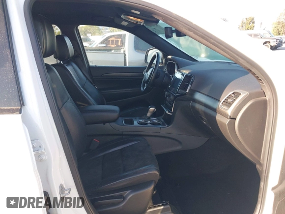 2019 Jeep Grand Cherokee Laredo with VIN 1C4RJEAG0KC858177, listed as a IAAI auction lot 42604812 with 79,932 mi miles and . Bid and sale history available at DreamBid. Image 5.