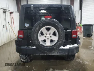 2018 Jeep Wrangler JK Unlimited Sport S with VIN 1C4BJWDG3JL854707, listed as a Copart auction lot 42000105 with 92,903 mi miles and Salvage Title. Bid and sale history available at carsss.com. Image 6.