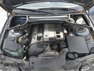 2005 BMW 3 Series 325i with VIN WBAET37445NJ85538, listed as a IAAI auction lot 41872686 with 121,237 mi miles. Bid and sale history available at carsss.com. Image 10.