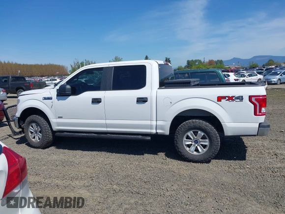 2015 Ford F-150 XLT z VIN 1FTEW1EPXFKE20880, wystawiony jako IAAI lot #42034493 z przebiegiem 152 588 mil mil oraz . Historia ofert i sprzedaży dostępna na DreamBid. Obrazek 14.