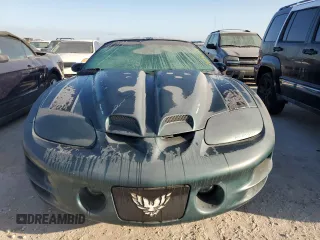 2000 Pontiac Firebird Formula z VIN 2G2FV22G2Y2160915, wystawiony jako Copart lot #76196454 z przebiegiem Nie podano mil oraz Czysty tytuł • Clean title. Historia ofert i sprzedaży dostępna na DreamBid. Obrazek 5.