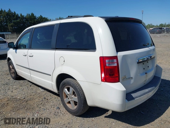 2010 Dodge Grand Caravan SXT with VIN 2D4RN5D12AR210330, listed as a IAAI auction lot 42146969 with 233,607 mi miles and . Bid and sale history available at DreamBid. Image 3.