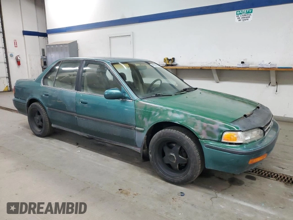 1993 Honda Accord z VIN 1HGCB7652PA155769, wystawiony jako Copart lot #45200625 z przebiegiem 251 834 mil mil oraz Szkoda całkowita • Salvage title. Historia ofert i sprzedaży dostępna na DreamBid. Obrazek 4.