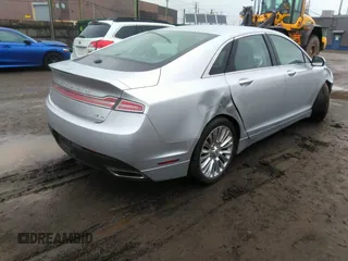 2013 Lincoln MKZ with VIN 3LN6L2JKXDR811822, listed as a IAAI auction lot 42009690 with 128,405 mi miles. Bid and sale history available at carsss.com. Image 4.