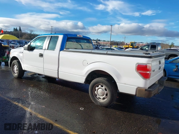 2014 Ford F-150 XL with VIN 1FTFX1CF4EKG53325, listed as a IAAI auction lot 41060015 with 216,554 mi miles. Bid and sale history available at carsss.com. Image 3.