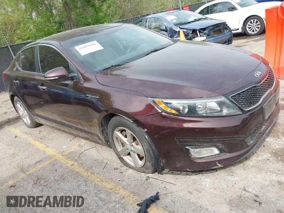 2015 Kia Optima LX with VIN 5XXGM4A79FG494002, listed as a IAAI auction lot 42082041 with 179,076 mi miles. Bid and sale history available at carsss.com. Image 1.