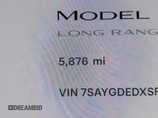 2025 Tesla Model Y Long Range with VIN 7SAYGDEDXSF248734, listed as a IAAI auction lot 41719195 with 5,876 mi miles and . Bid and sale history available at DreamBid. Image 15.