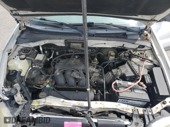 2002 Ford Escape XLT Choice with VIN 1FMYU04172KA40489, listed as a Copart auction lot 58437165 with 212,793 mi miles and Salvage title. Bid and sale history available at DreamBid. Image 12.