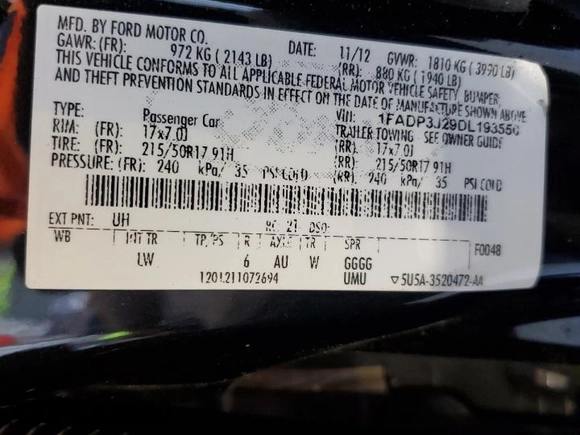 2013 Ford Focus Titanium with VIN 1FADP3J29DL193550, listed as a Copart auction lot 48848985 with 159,294 mi miles and Salvage Title. Bid and sale history available at carsss.com. Image 12.