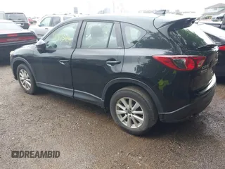 2013 Mazda CX-5 Sport with VIN JM3KE2BE8D0125002, listed as a IAAI auction lot 42425404 with 183,551 mi miles and . Bid and sale history available at DreamBid. Image 3.