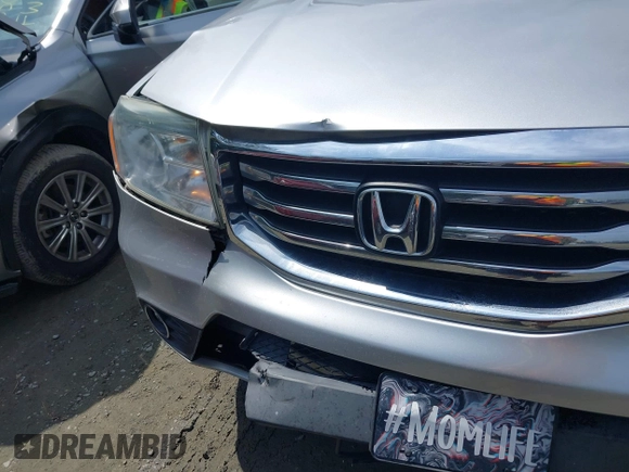 2012 Honda Pilot EX-L with VIN 5FNYF3H54CB019160, listed as a IAAI auction lot 42481437 with 142,911 mi miles and . Bid and sale history available at DreamBid. Image 6.