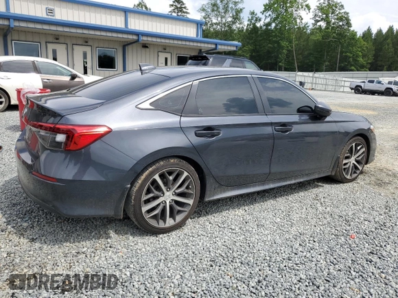 2024 Honda Civic Touring z VIN 2HGFE1F96RH324748, wystawiony jako Copart lot #58833725 z przebiegiem Nie podano mil oraz Szkoda całkowita • Salvage title. Historia ofert i sprzedaży dostępna na DreamBid. Obrazek 3.