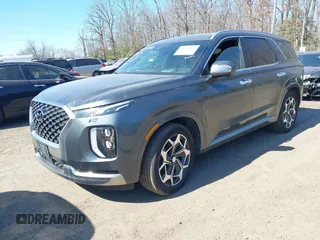 2022 Hyundai Palisade Calligraphy z VIN KM8R7DHE6NU407925, wystawiony jako IAAI lot #41737020 z przebiegiem 50 074 mil mil oraz . Historia ofert i sprzedaży dostępna na DreamBid. Obrazek 2.
