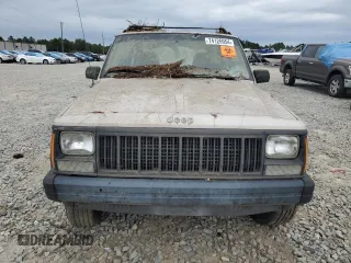 1995 Jeep Cherokee Sport with VIN 1J4FJ68S4SL618773, listed as a Copart auction lot 74126954 with 318,519 mi miles and Salvage title. Bid and sale history available at DreamBid. Image 5.