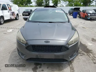 2015 Ford Focus Titanium z VIN 1FADP3N2XFL357224, wystawiony jako Copart lot #55626575 z przebiegiem 159 422 mil mil oraz Szkoda całkowita • Salvage title. Historia ofert i sprzedaży dostępna na DreamBid. Obrazek 5.