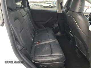 2023 Tesla Model Y Long Range z VIN 7SAYGAEE5PF743079, wystawiony jako Copart lot #45570655 z przebiegiem 46 145 mil mil oraz Szkoda całkowita • Salvage title. Historia ofert i sprzedaży dostępna na DreamBid. Obrazek 12.