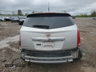 2010 Cadillac SRX Luxury Collection z VIN 3GYFNDEY1AS565329, wystawiony jako Copart lot #55753015 z przebiegiem Nie podano mil oraz Szkody całkowita. Historia ofert i sprzedaży dostępna na DreamBid. Obrazek 6.
