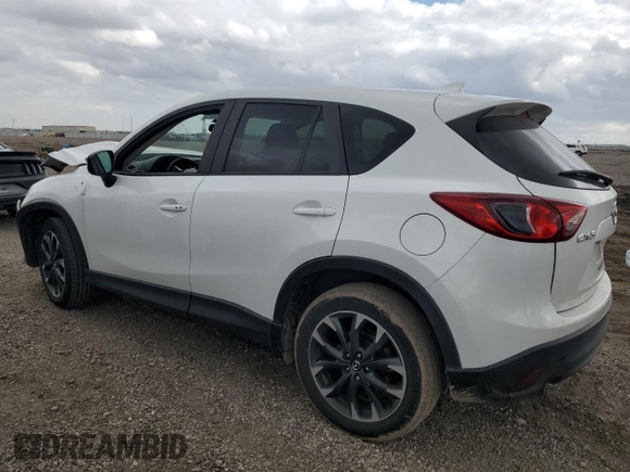 2016 Mazda CX-5 Grand Touring with VIN JM3KE2DYXG0784971, listed as a Copart auction lot 43865605 with 146,025 mi miles and Salvage Title. Bid and sale history available at carsss.com. Image 2.