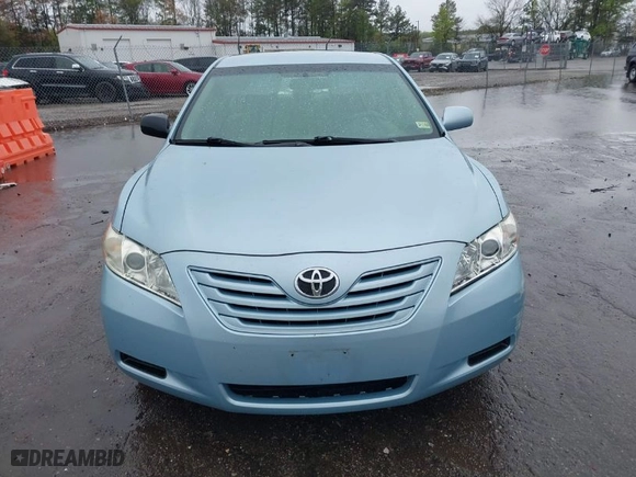 2007 Toyota Camry CE with VIN 4T1BE46K57U714232, listed as a IAAI auction lot 41963018 with 143,777 mi miles. Bid and sale history available at carsss.com. Image 12.