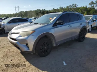 2018 Toyota RAV4 XLE with VIN 2T3RFREV5JW731373, listed as a Copart auction lot 51917465 with 124,623 mi miles and Salvage Title. Bid and sale history available at DreamBid. Image 1.