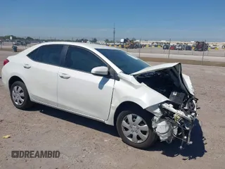 2019 Toyota Corolla L with VIN 5YFBURHE0KP882524, listed as a IAAI auction lot 41862382 with 84,981 mi miles. Bid and sale history available at carsss.com. Image 1.