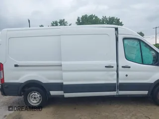 2019 Ford Transit z VIN 1FTYR2CM1KKA28111, wystawiony jako IAAI lot #42439960 z przebiegiem 116 173 mil mil oraz . Historia ofert i sprzedaży dostępna na DreamBid. Obrazek 13.