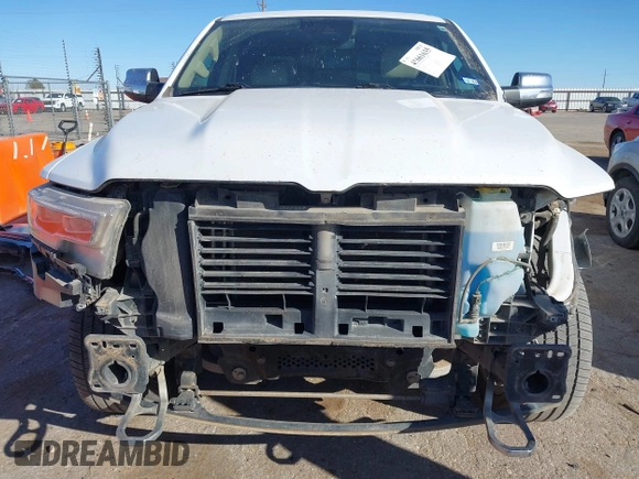 2020 Ram 1500 Limited with VIN 1C6SRFHT7LN258515, listed as a IAAI auction lot 41661635 with 125,699 mi miles and . Bid and sale history available at DreamBid. Image 13.