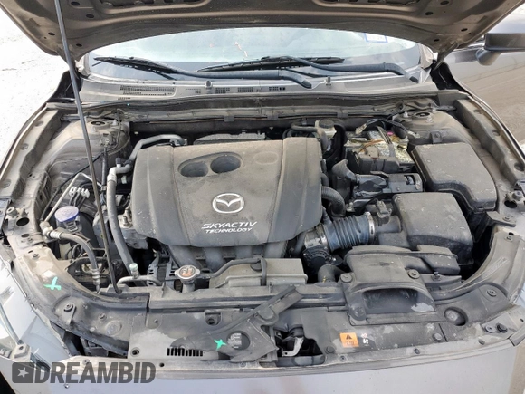 2014 Mazda 3 i Touring z VIN 3MZBM1V76EM112344, wystawiony jako Copart lot #57168785 z przebiegiem 122 826 mil mil oraz Szkoda całkowita • Salvage title. Historia ofert i sprzedaży dostępna na DreamBid. Obrazek 11.