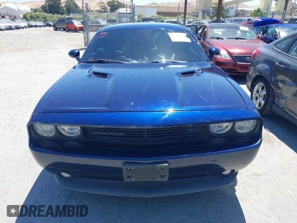 2013 Dodge Challenger R/T z VIN 2C3CDYBT9DH565280, wystawiony jako IAAI lot #42315527 z przebiegiem 128 638 mil mil oraz . Historia ofert i sprzedaży dostępna na DreamBid. Obrazek 12.