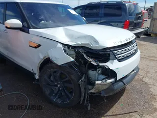 2018 Land Rover Discovery HSE Luxury z VIN SALRT2RV1JA075819, wystawiony jako IAAI lot #42157121 z przebiegiem 93 829 mil mil oraz . Historia ofert i sprzedaży dostępna na DreamBid. Obrazek 6.