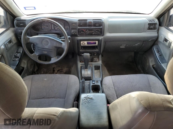 1999 Isuzu Rodeo S with VIN 4S2CK58W3X4362974, listed as a Copart auction lot 43155155 with 396,448 mi miles and Salvage Title. Bid and sale history available at DreamBid. Image 8.